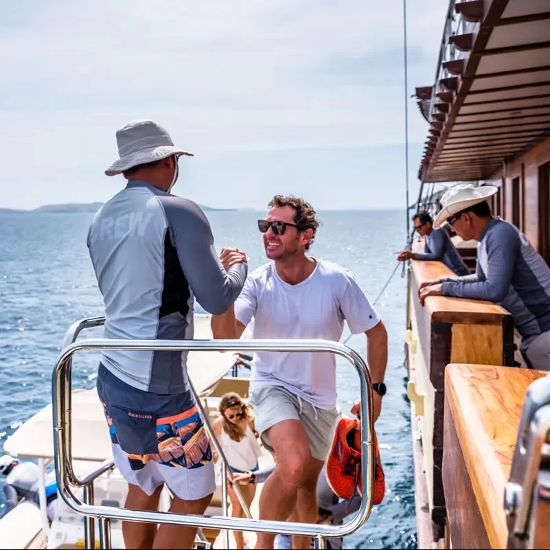 Crew members working on deck