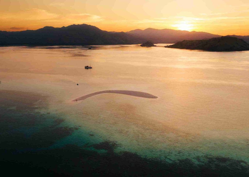 Sandbar and anchorage at sunset in Komodo National Park