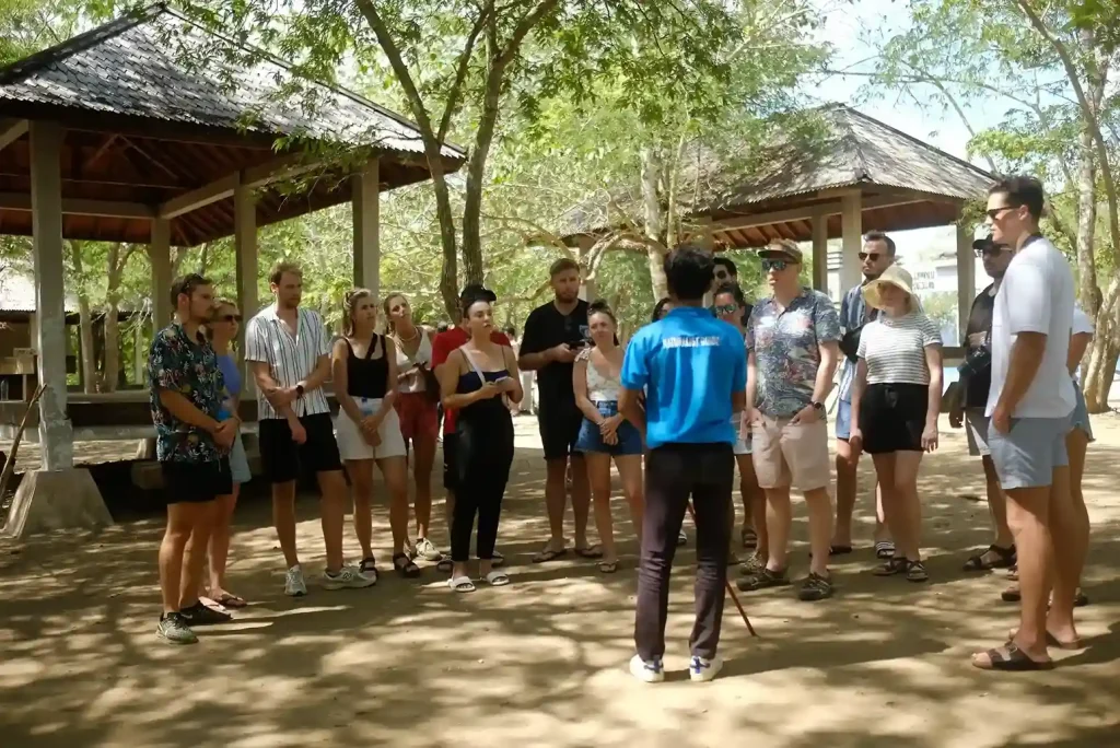 Park ranger briefing a group of visitors in Komodo National Park